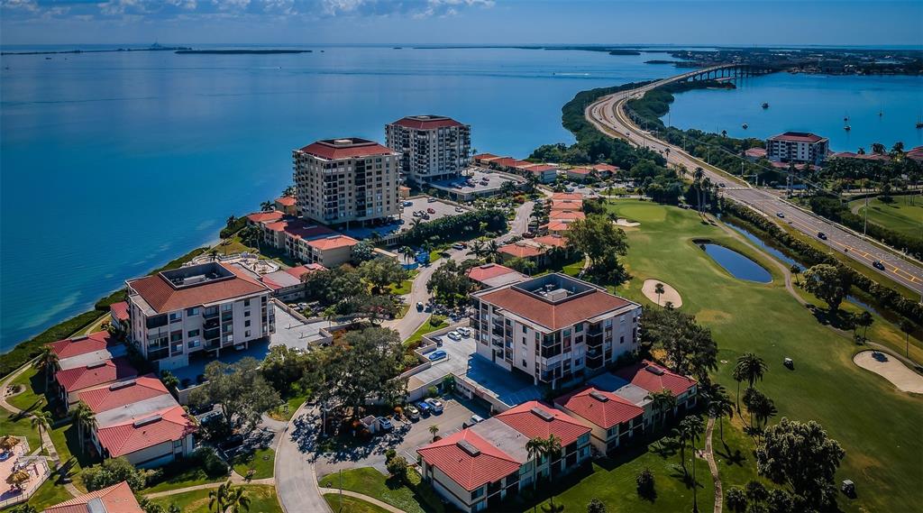 Palma Del Mar is not only surrounded by water and connected by accessible bridges but is also enveloped by the lush greens of the golf course, creating a picturesque and serene environment for its residents.