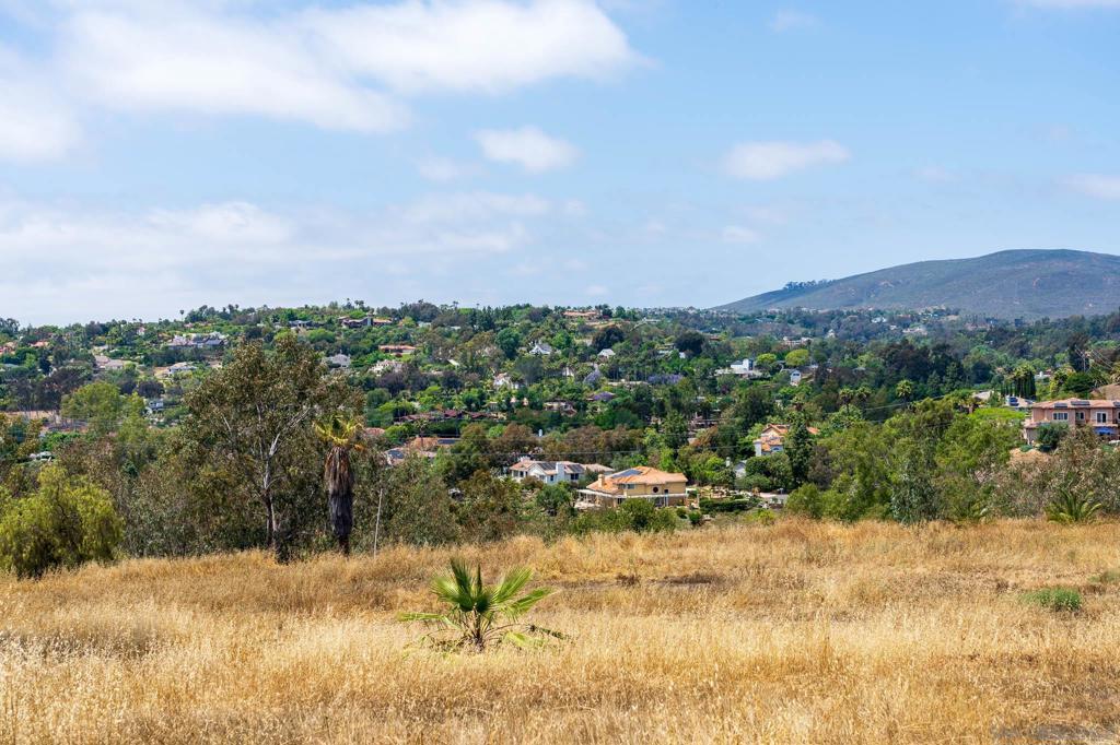 18096 Loma Alegre Rancho Santa Fe, CA 92067 - Photo 11 of 12 a view of a lake with houses