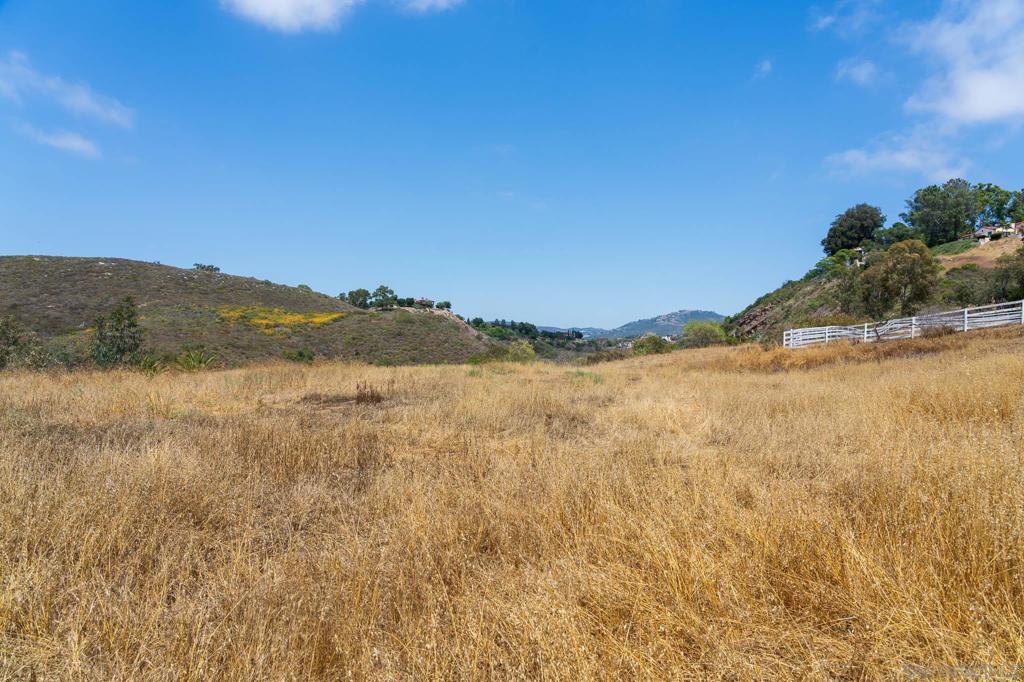 18096 Loma Alegre Rancho Santa Fe, CA 92067 - Photo 4 of 12 a view of lake and mountain