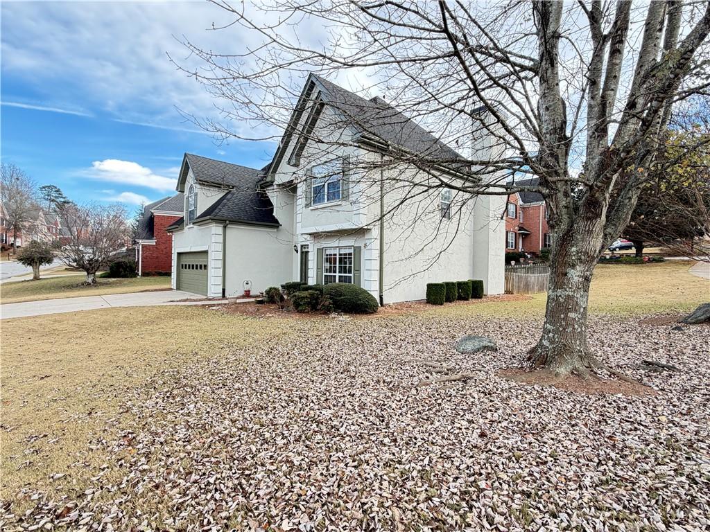 1530 Oglethorpe Run Lane Suwanee, GA 30024 - Photo 3 of 46