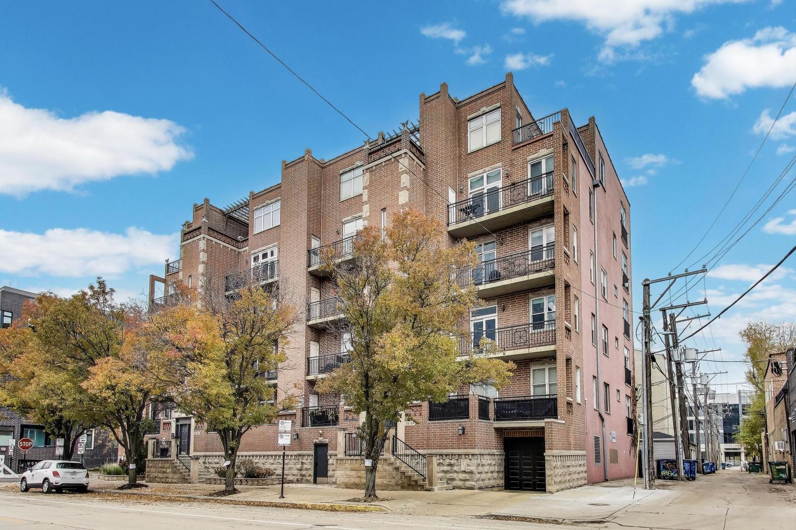 a view of a building and a street