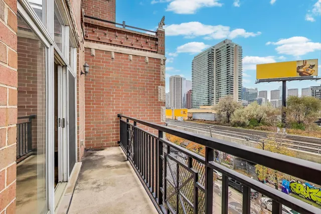 a view of a street from a balcony