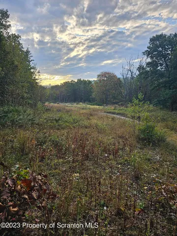 a view of an outdoor space and mountain view