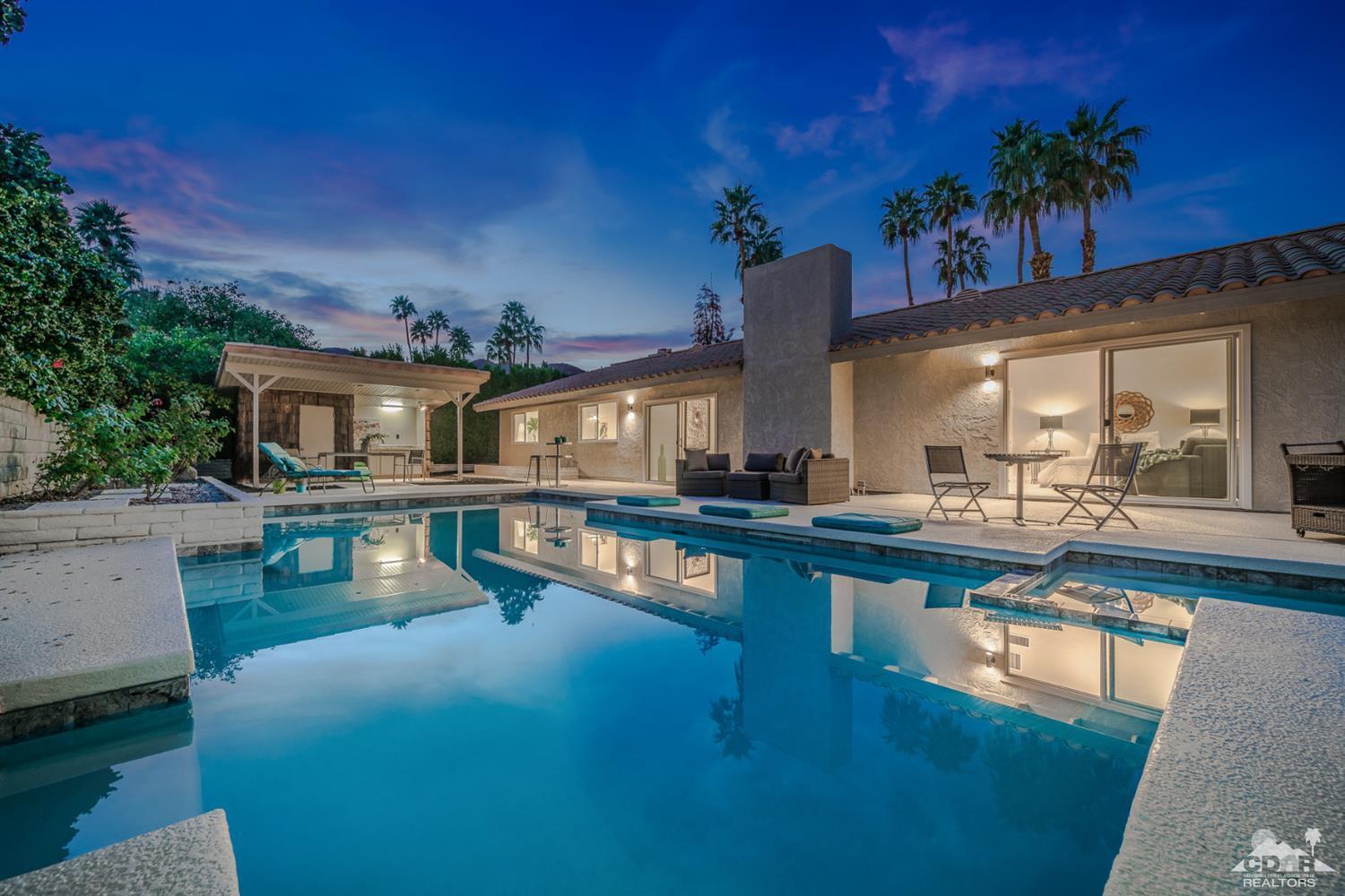 72845 Haystack Road Palm Desert, CA 92260 - Photo 2 of 39 a swimming pool view with a seating space