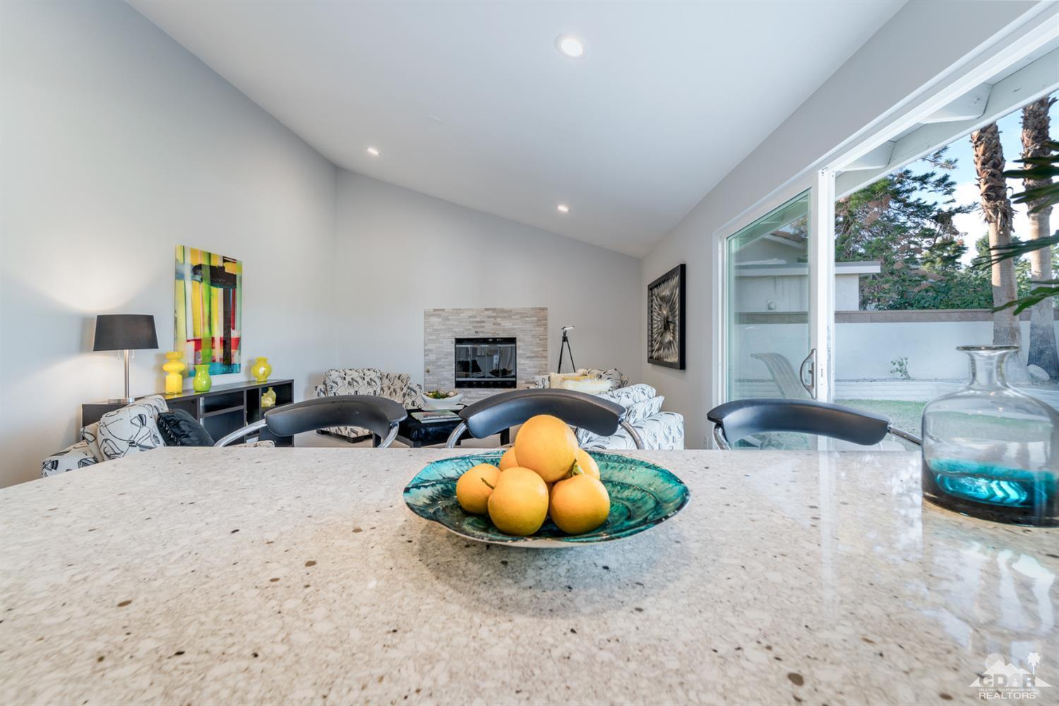 72845 Haystack Road Palm Desert, CA 92260 - Photo 15 of 39 a view of a lobby with furniture and floor to ceiling window