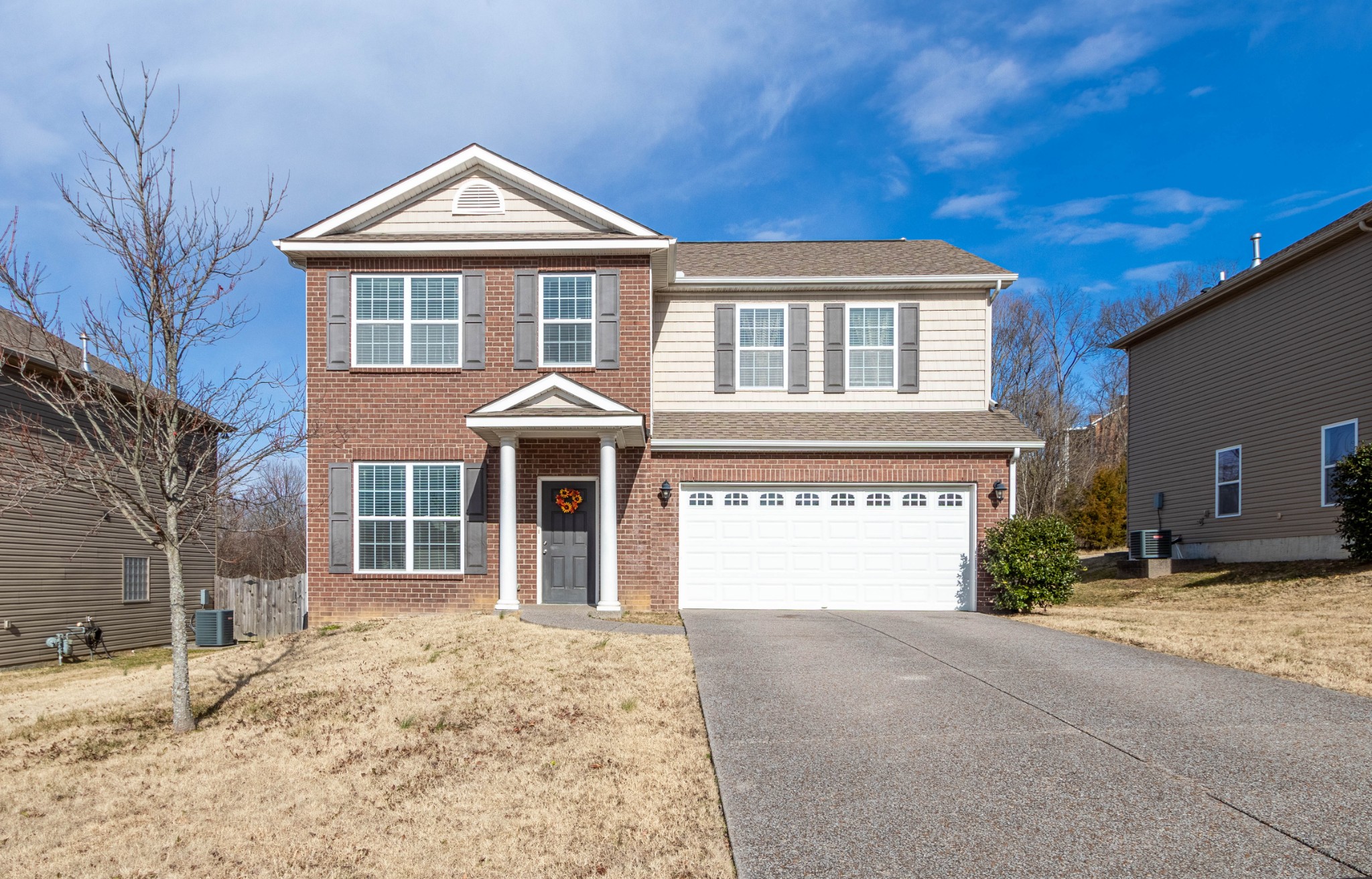 6017 Cane Springs Road Antioch, TN 37013 - Photo 1 of 35 a front view of a house with a yard