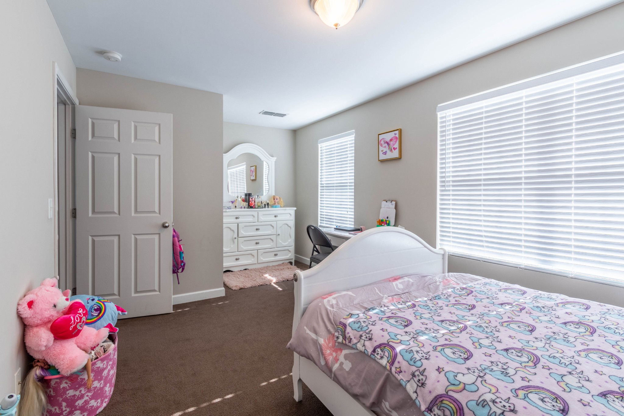 6017 Cane Springs Road Antioch, TN 37013 - Photo 18 of 35 a bedroom with a bed and a window