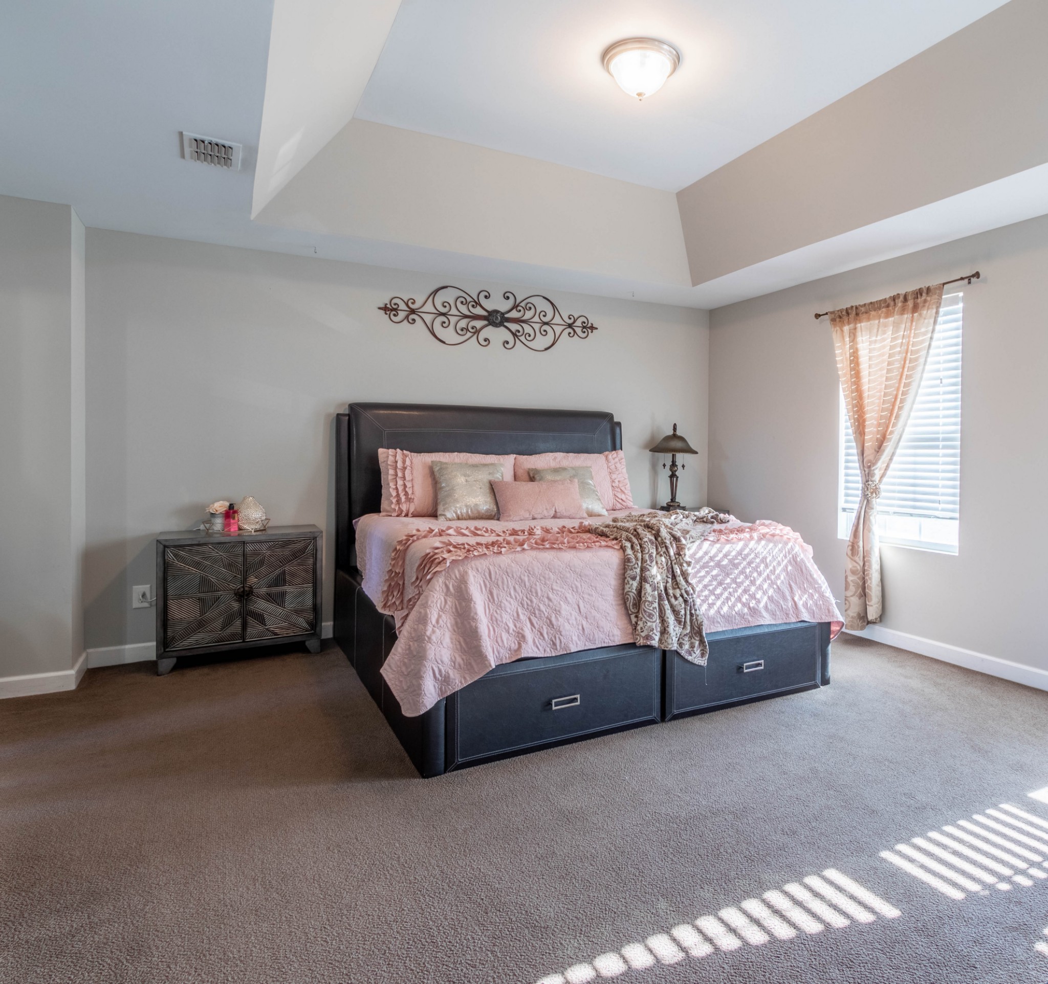 6017 Cane Springs Road Antioch, TN 37013 - Photo 22 of 35 a bedroom with a bed and a large window