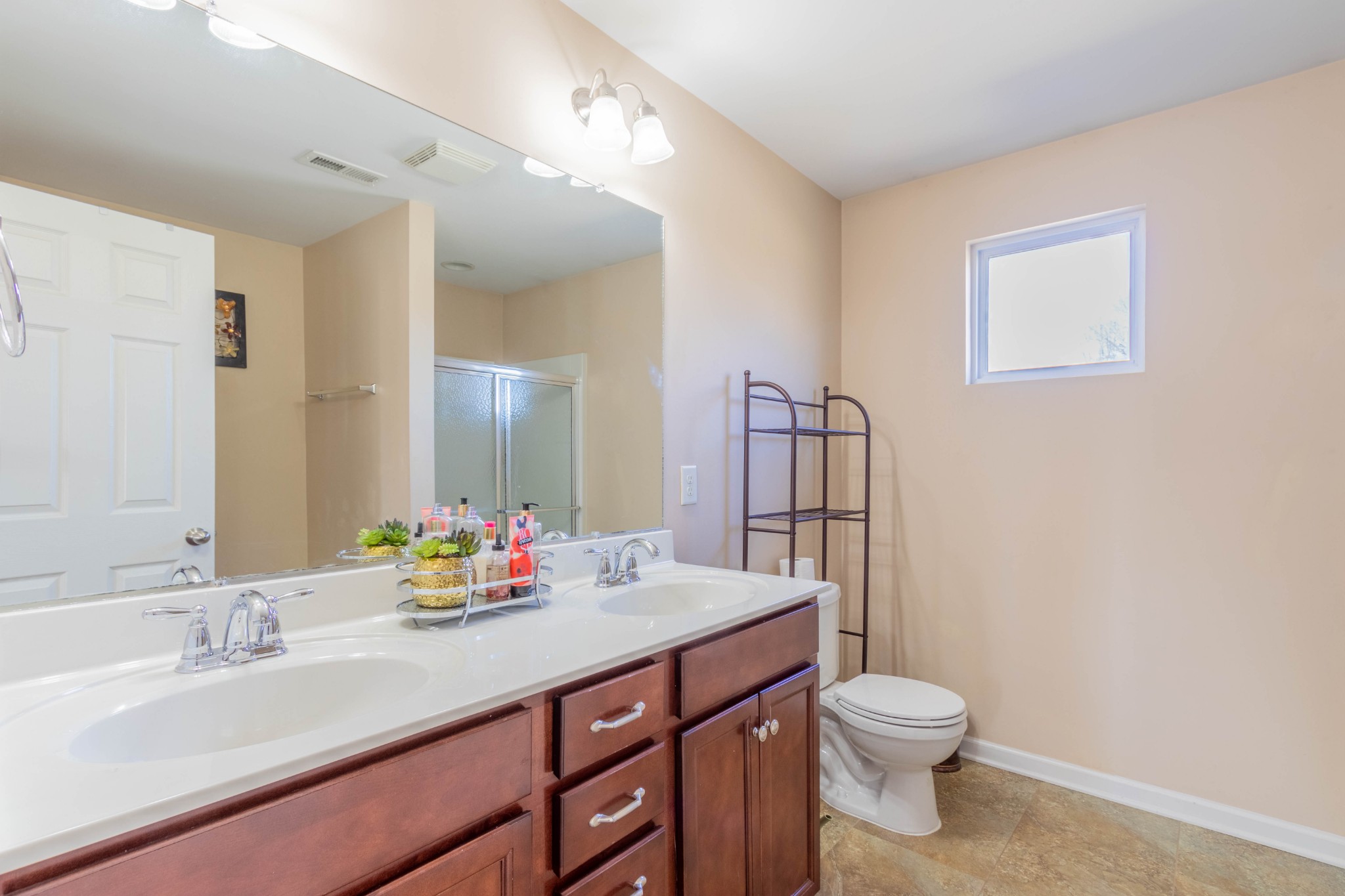 6017 Cane Springs Road Antioch, TN 37013 - Photo 25 of 35 a bathroom with a sink vanity granite and toilet