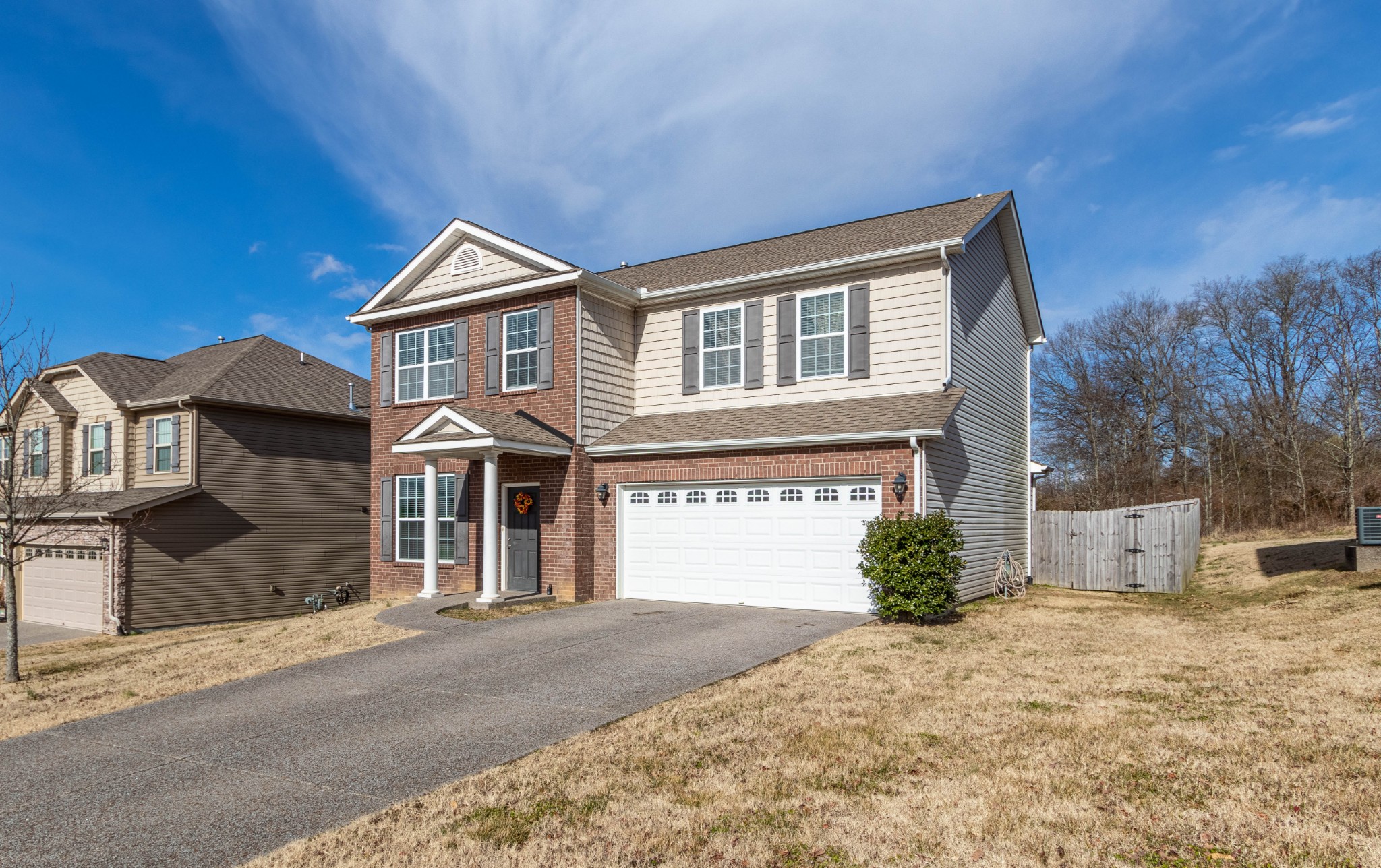 6017 Cane Springs Road Antioch, TN 37013 - Photo 35 of 35 a front view of a house with a yard and garage