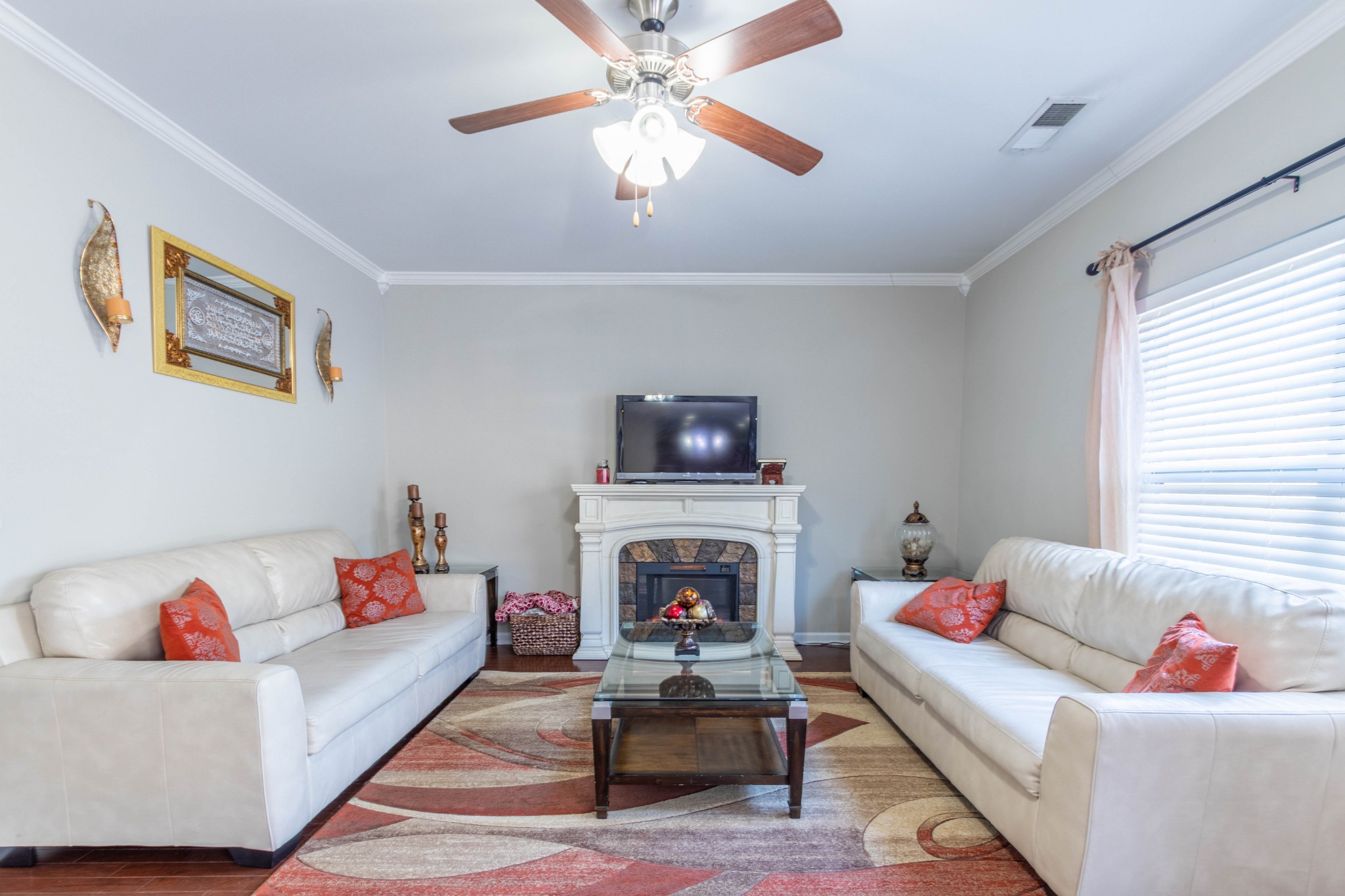6017 Cane Springs Road Antioch, TN 37013 - Photo 7 of 35 a living room with furniture and a fireplace
