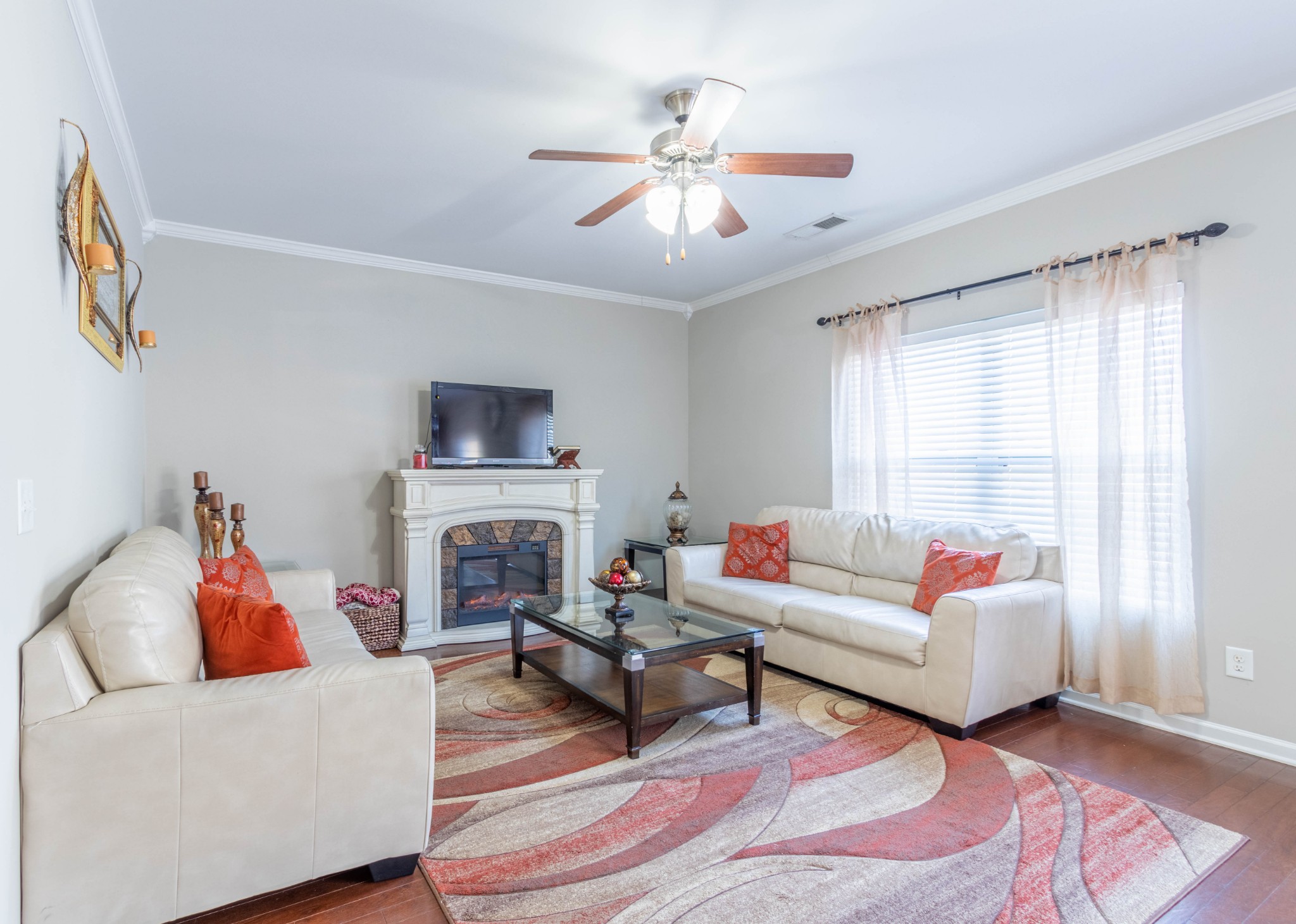 6017 Cane Springs Road Antioch, TN 37013 - Photo 8 of 35 a living room with furniture and a fireplace