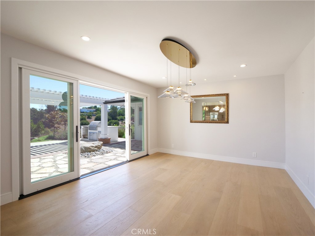 2 Flying Mane Road Rolling Hills, CA 90274 - Photo 13 of 49 a view of a livingroom with wooden floor