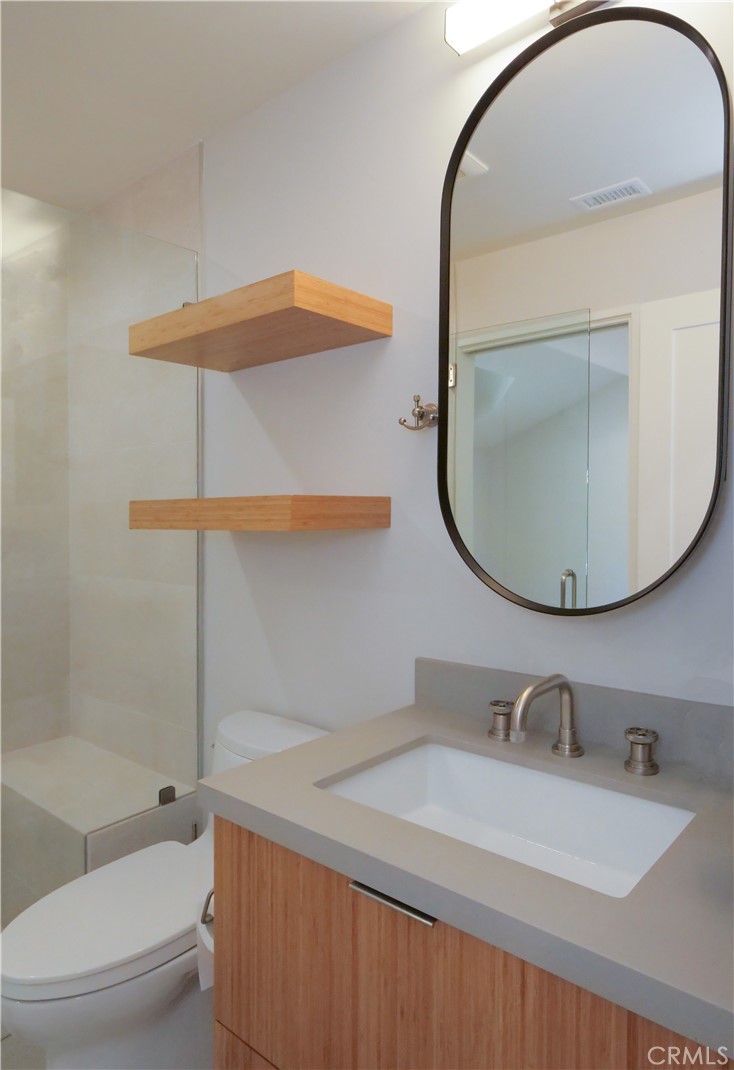 2 Flying Mane Road Rolling Hills, CA 90274 - Photo 17 of 49 a bathroom with a sink and a mirror