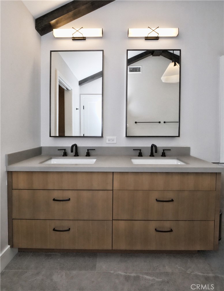 2 Flying Mane Road Rolling Hills, CA 90274 - Photo 31 of 49 a bathroom with a double vanity sink and mirror