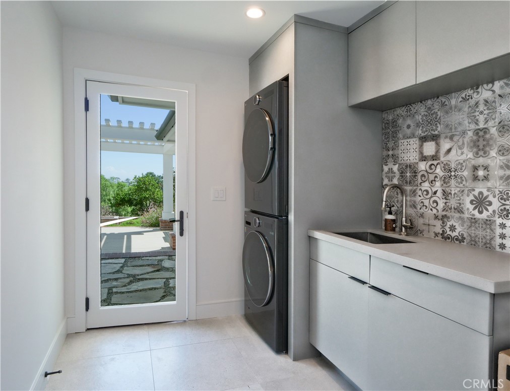 2 Flying Mane Road Rolling Hills, CA 90274 - Photo 33 of 49 a view of a storage and utility room with washer and dryer