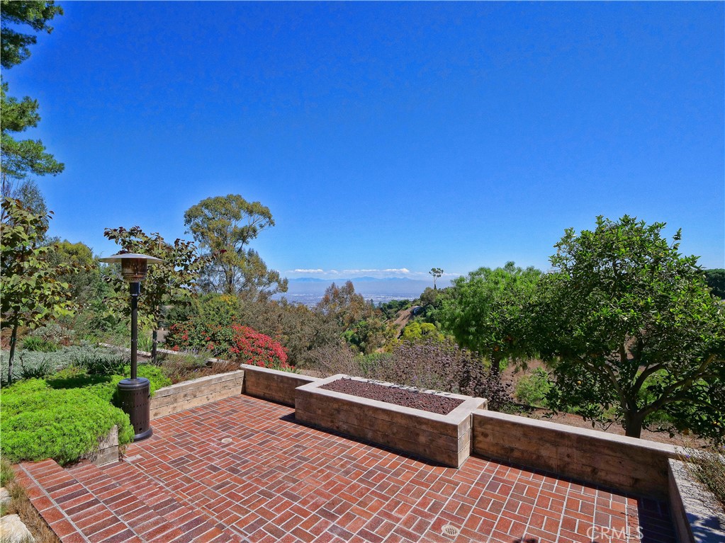 2 Flying Mane Road Rolling Hills, CA 90274 - Photo 36 of 49 a view of a chairs and table on the wooden floor