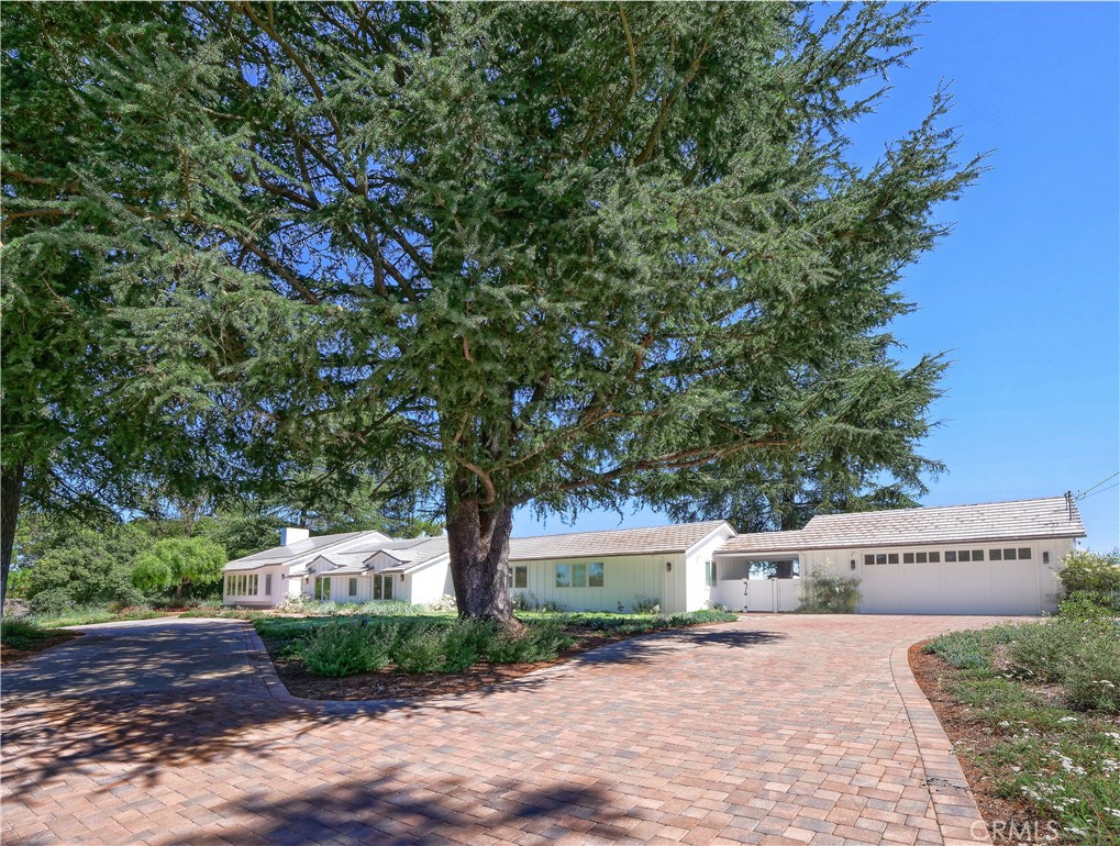 2 Flying Mane Road Rolling Hills, CA 90274 - Photo 49 of 49 a front view of a house with a yard and garage