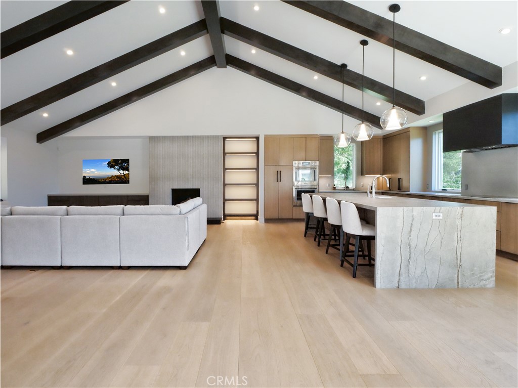 2 Flying Mane Road Rolling Hills, CA 90274 - Photo 7 of 49 a large white kitchen with a large counter top appliances and cabinets