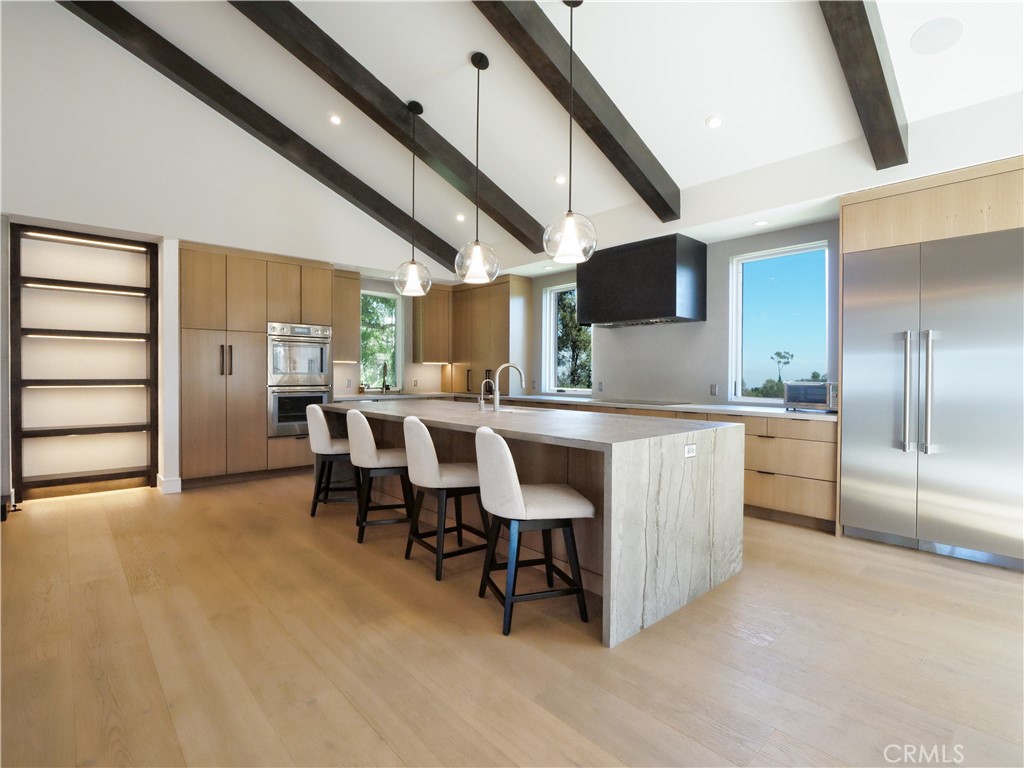 2 Flying Mane Road Rolling Hills, CA 90274 - Photo 8 of 49 a kitchen with cabinets and chairs
