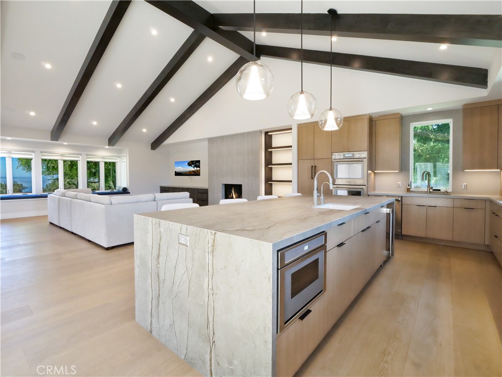 2 Flying Mane Road Rolling Hills, CA 90274 - Photo 9 of 49 a large white kitchen with a large window