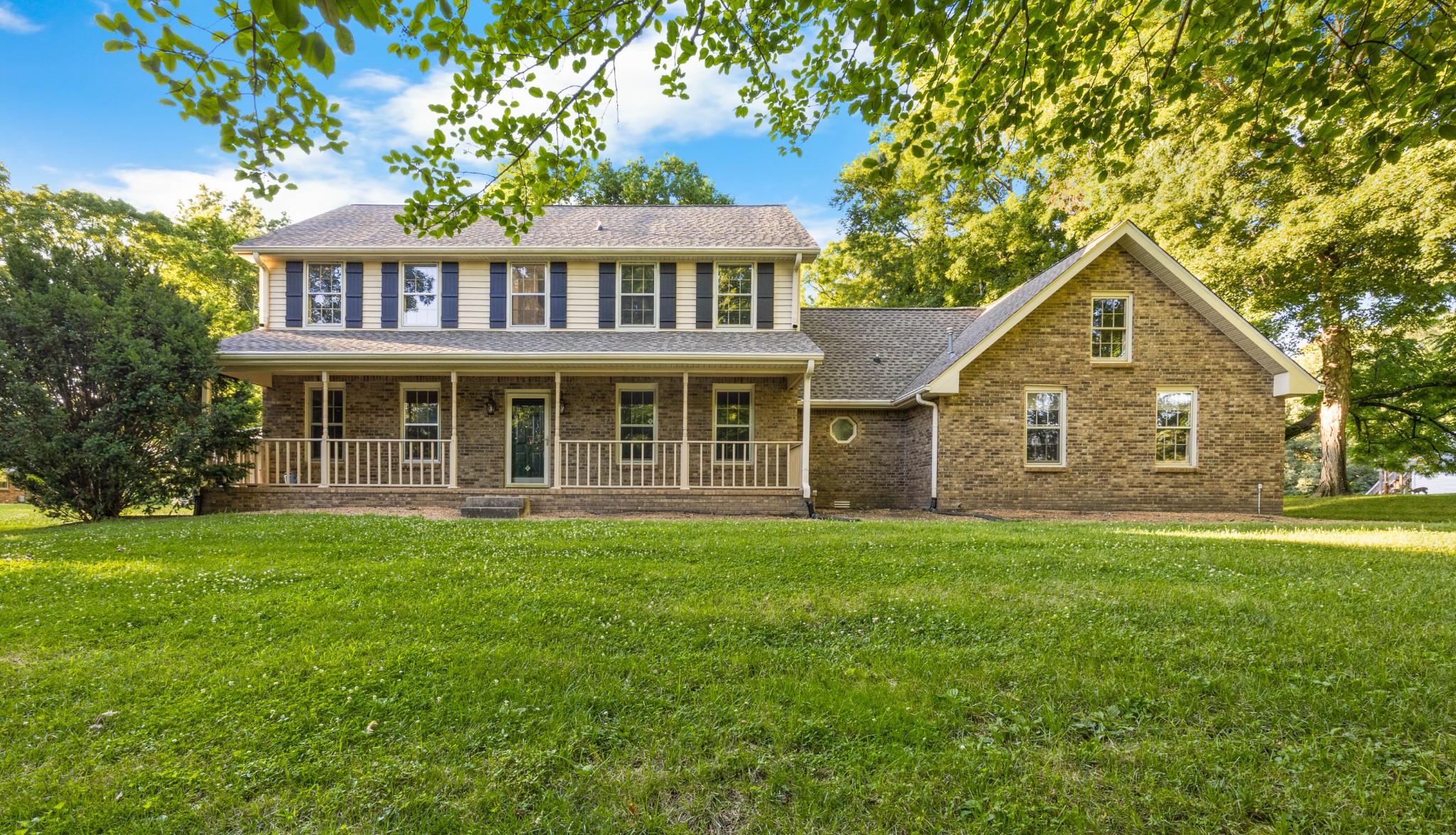407 Idaho Springs Road Clarksville, TN 37043 - Photo 1 of 45 a front view of a house with a garden