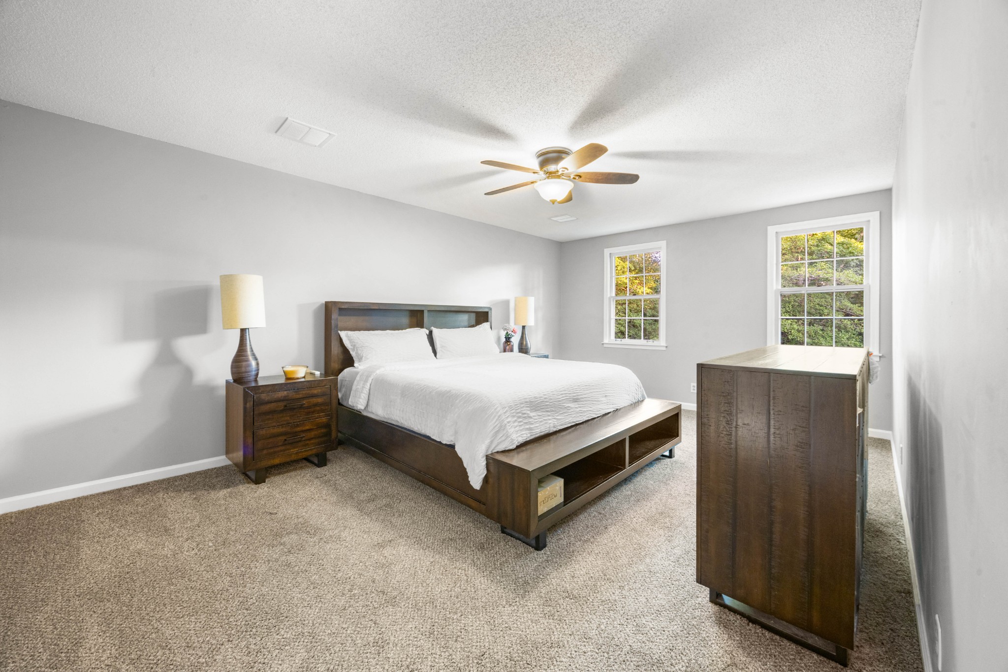 407 Idaho Springs Road Clarksville, TN 37043 - Photo 22 of 45 a bed room with a bed and a ceiling fan