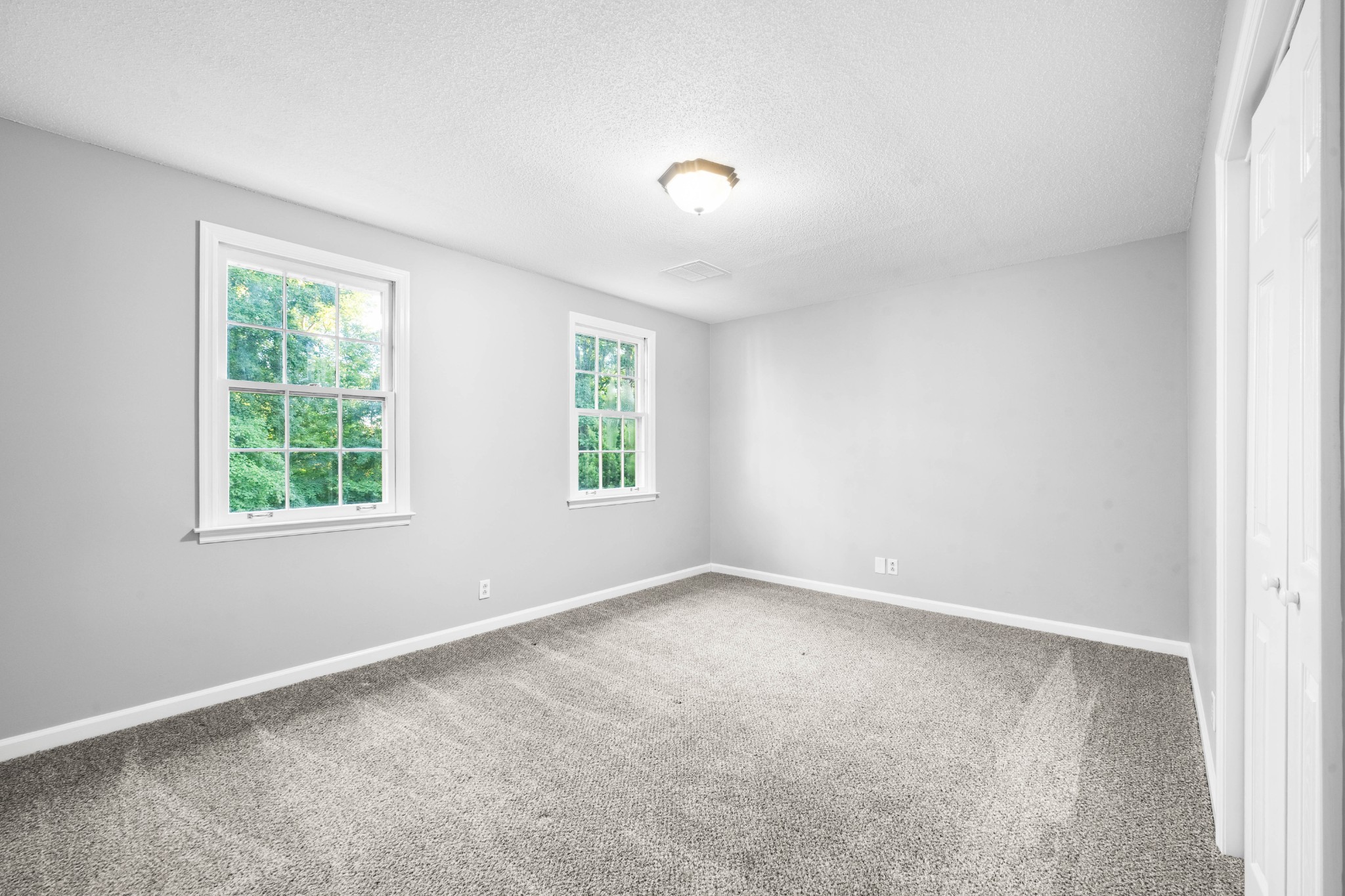 407 Idaho Springs Road Clarksville, TN 37043 - Photo 31 of 45 an empty room with windows
