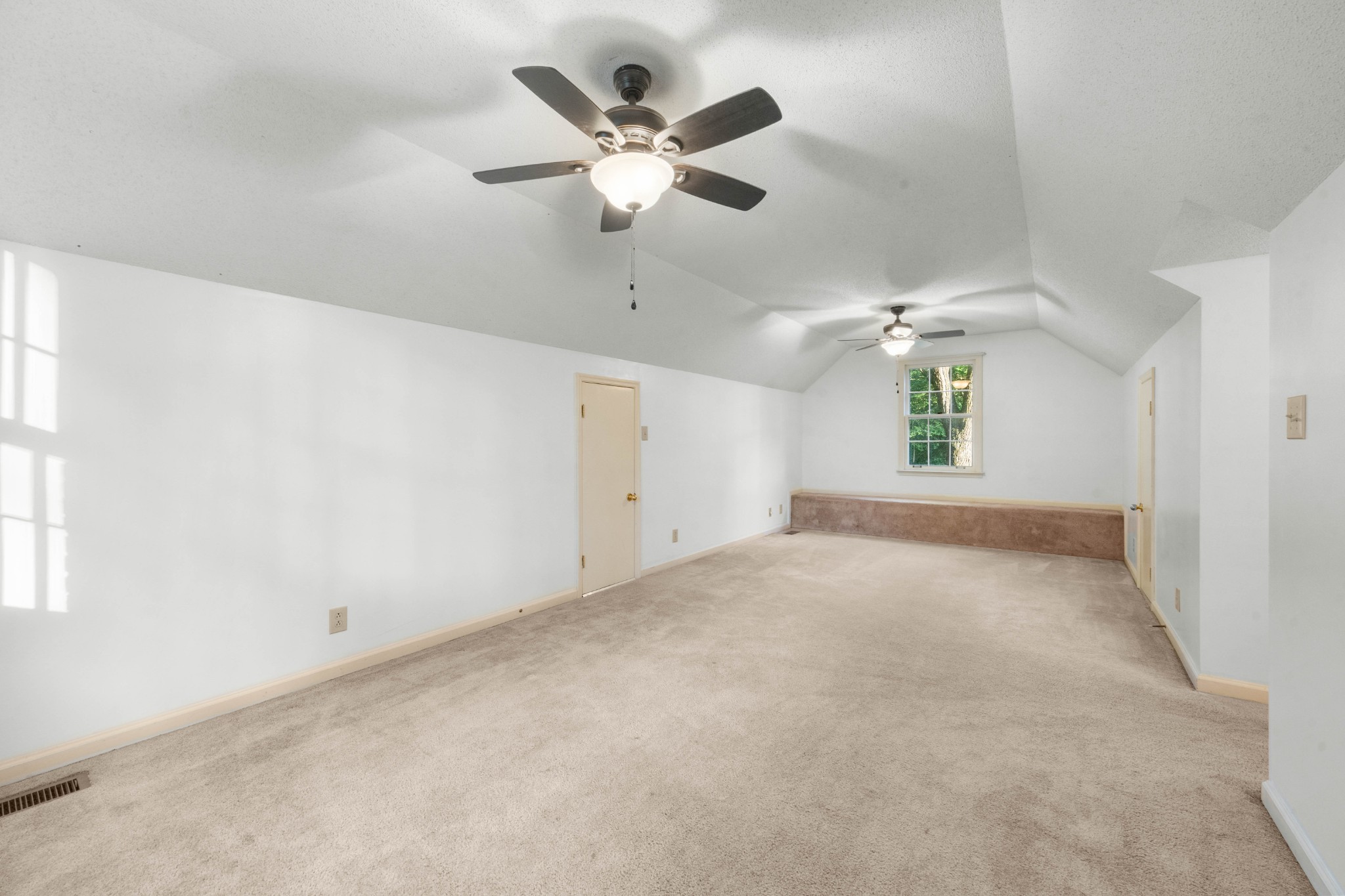 407 Idaho Springs Road Clarksville, TN 37043 - Photo 33 of 45 an empty room with a ceiling fan and window