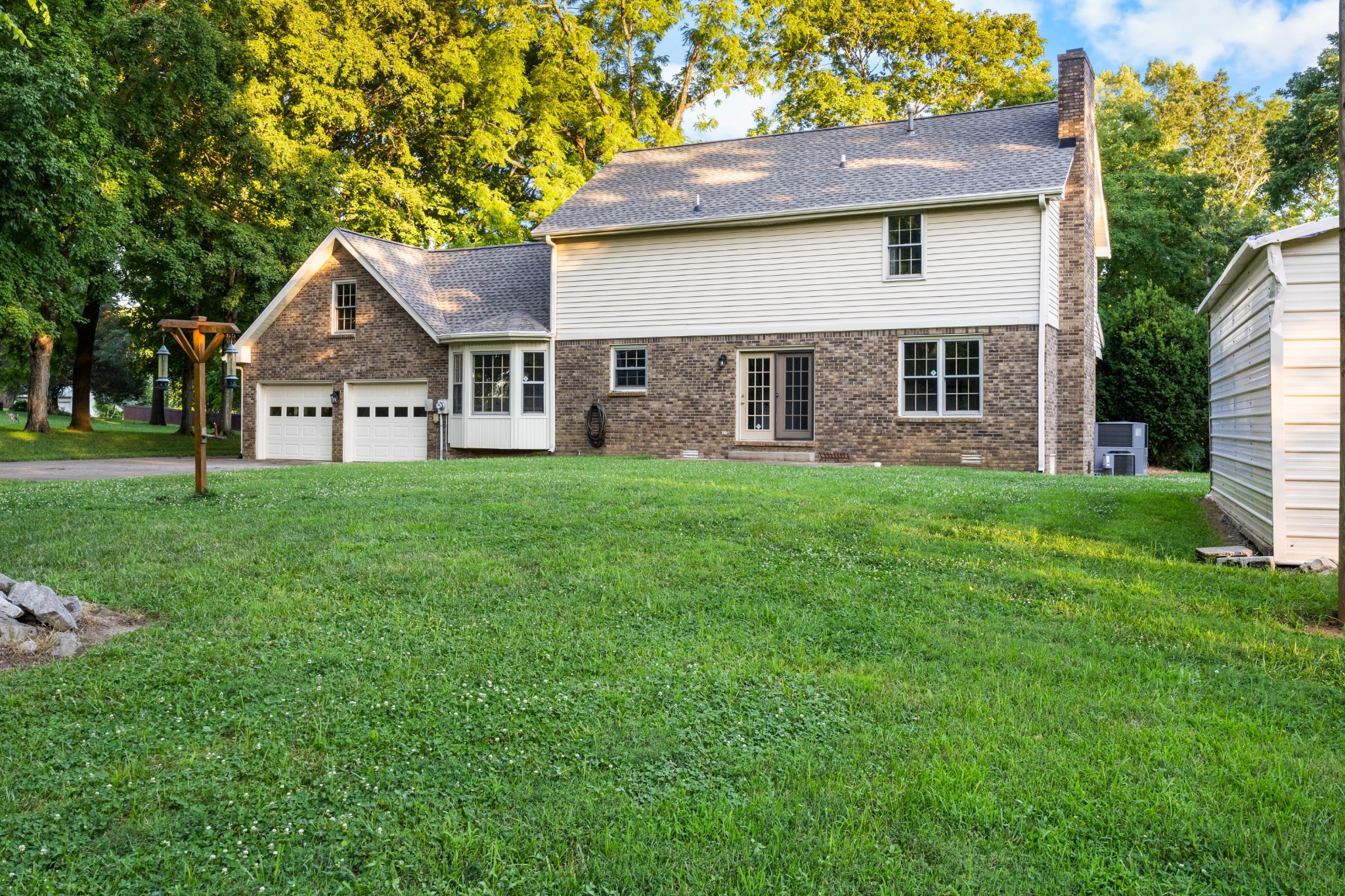 407 Idaho Springs Road Clarksville, TN 37043 - Photo 37 of 45 a front view of a house with a yard and trees