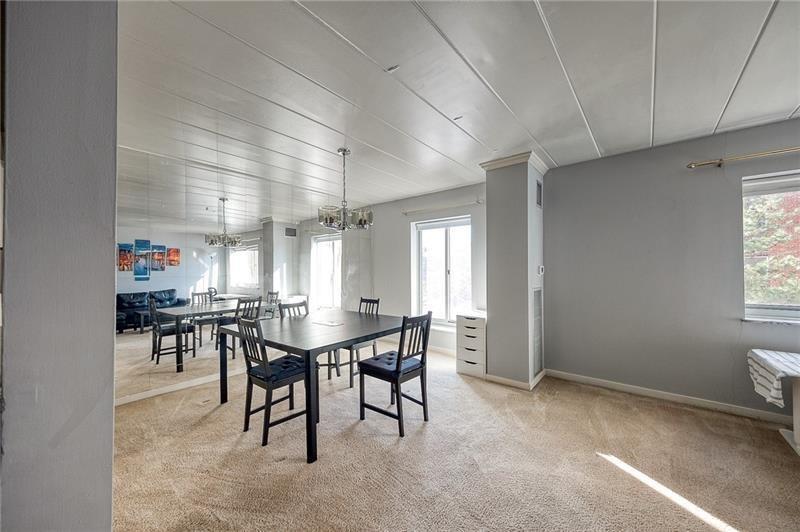 5 Bayard Road, Unit 309 Pittsburgh, PA 15213 - Photo 11 of 22 a view of a dining room with furniture and window