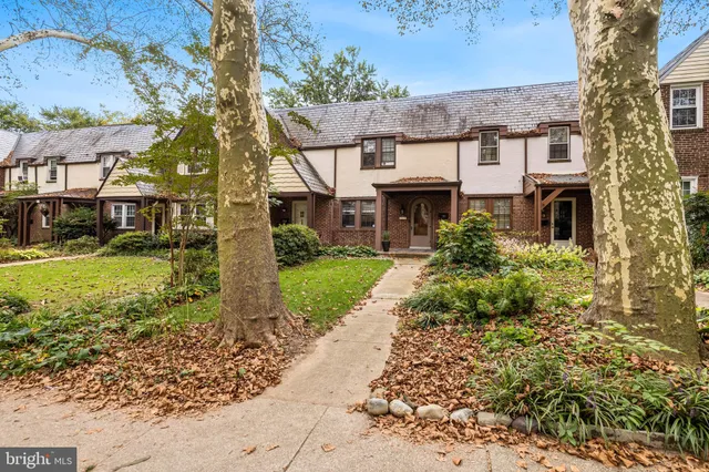 front view of a house with a garden