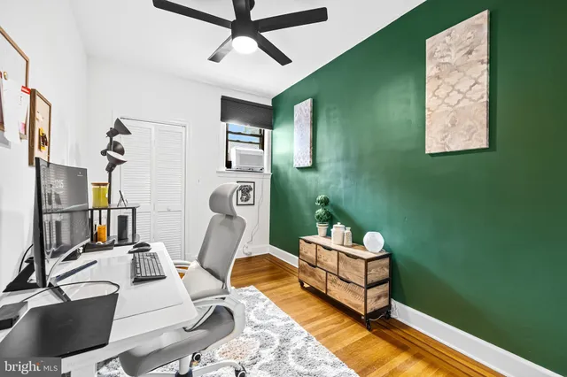 a room with furniture and a flat screen tv