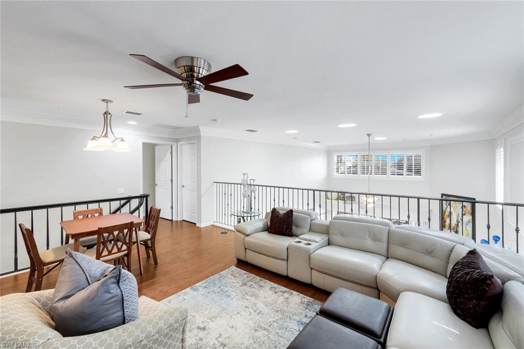 11426 Quail Village Way Naples, FL 34119 - Photo 22 of 46 a living room with furniture