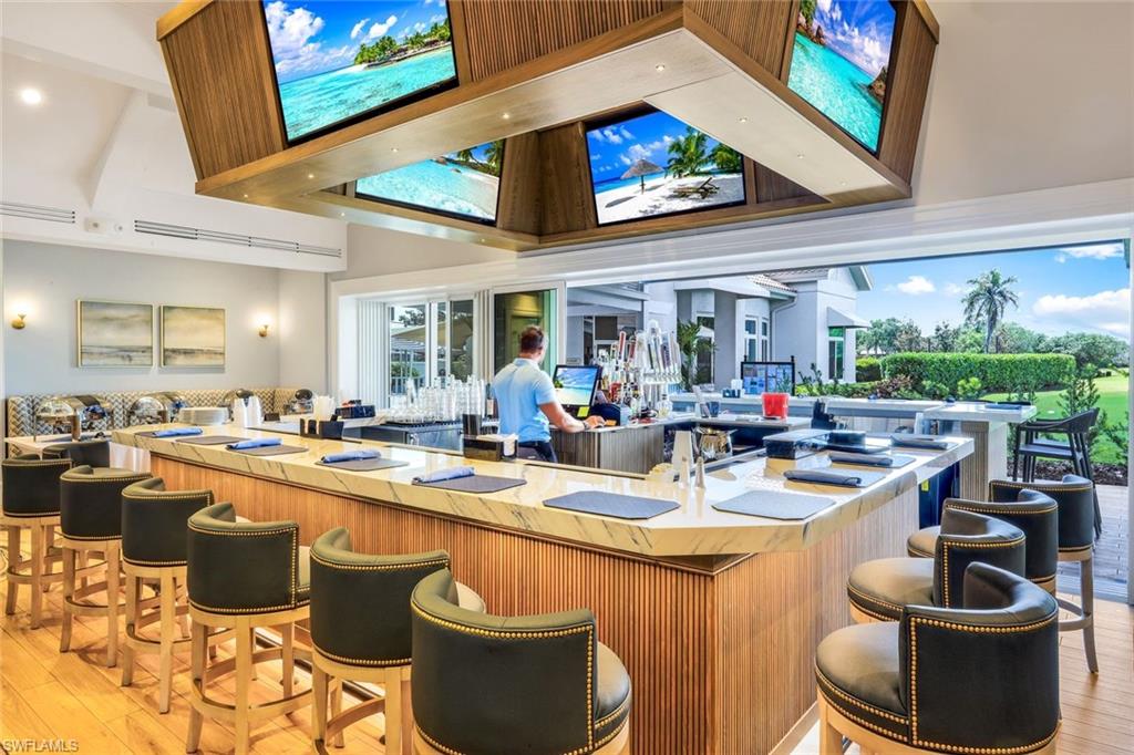 11426 Quail Village Way Naples, FL 34119 - Photo 41 of 46 a kitchen with lots of counter top space