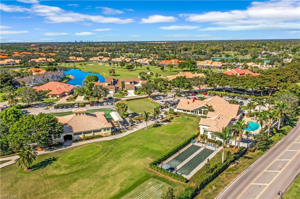 11426 Quail Village Way Naples, FL 34119 - Photo 45 of 46 a view of a city with an ocean