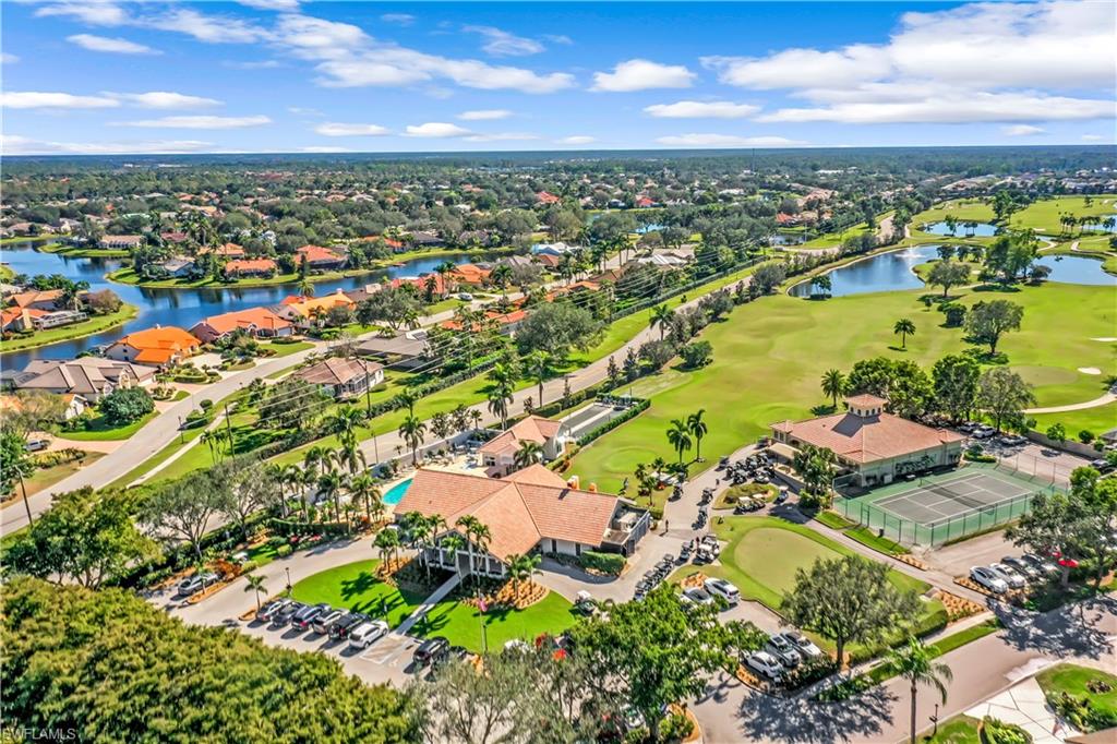 11426 Quail Village Way Naples, FL 34119 - Photo 46 of 46 an aerial view of residential houses with outdoor space