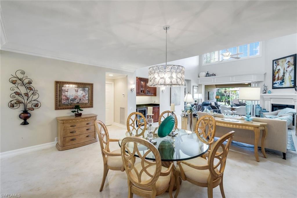 11426 Quail Village Way Naples, FL 34119 - Photo 7 of 46 a view of a dining room and livingroom