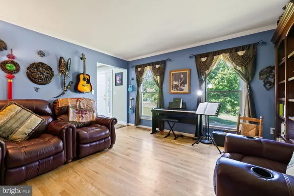 a large kitchen with lots of counter space and dining table