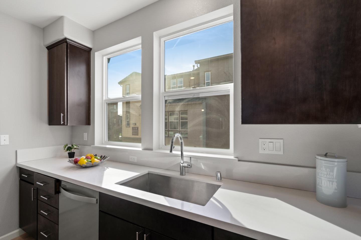 495 Snap Dragon Street Milpitas, CA 95035 - Photo 13 of 33 a kitchen with a sink and a window