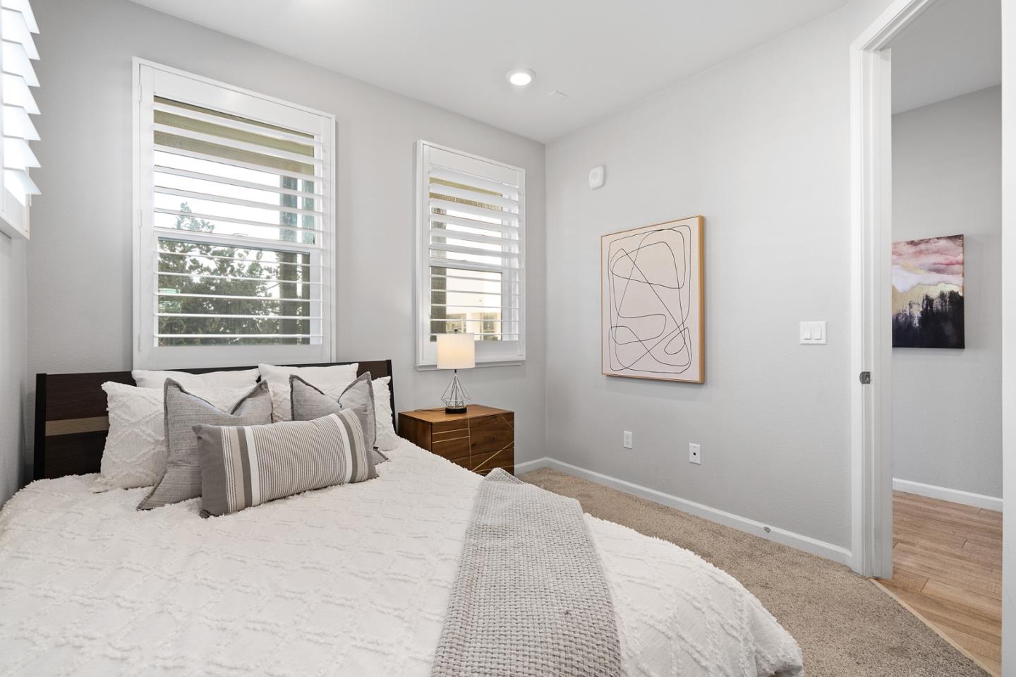 495 Snap Dragon Street Milpitas, CA 95035 - Photo 17 of 33 a bedroom with a large bed and a window