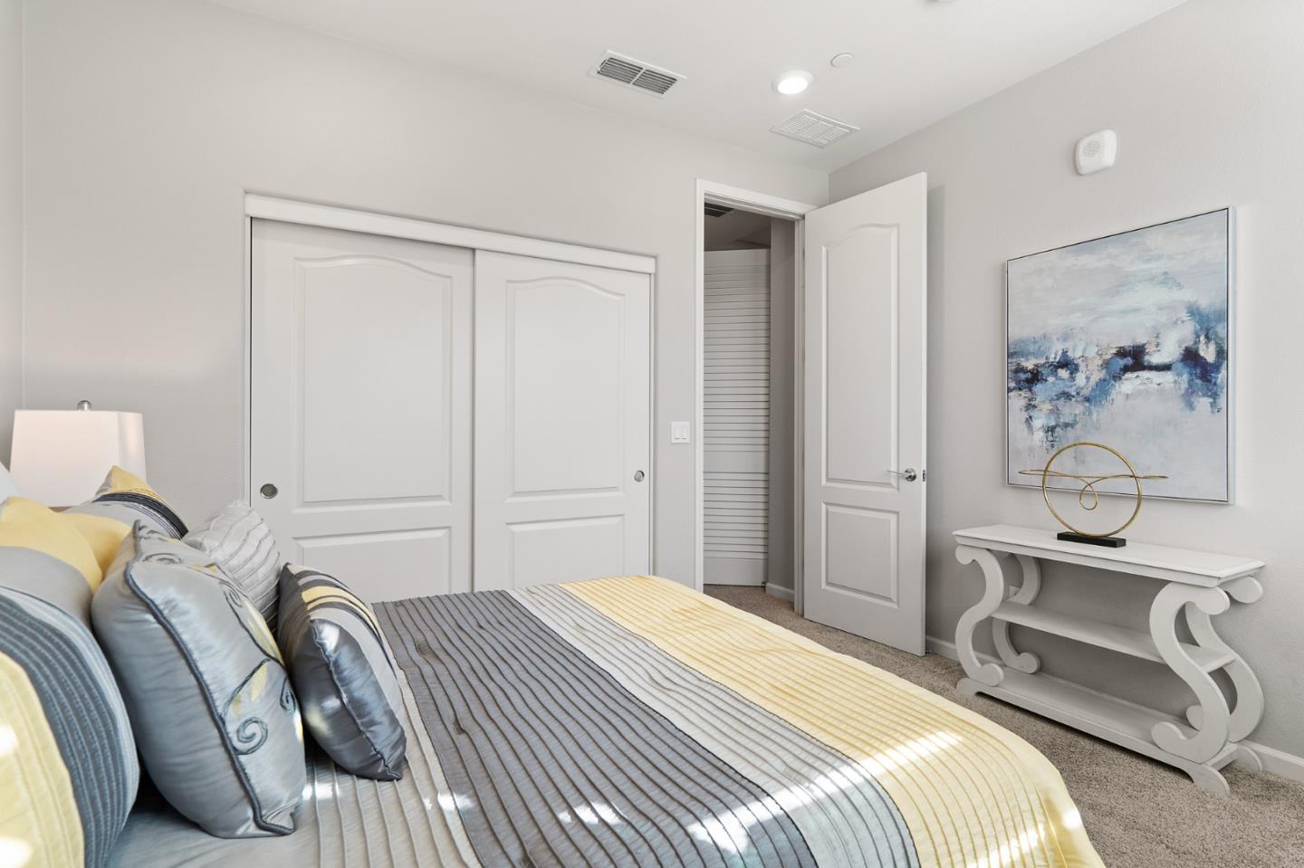 495 Snap Dragon Street Milpitas, CA 95035 - Photo 18 of 33 a bedroom with a bed and a painting on the wall