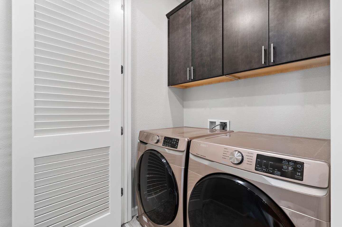 495 Snap Dragon Street Milpitas, CA 95035 - Photo 25 of 33 a utility room with dryer and washer