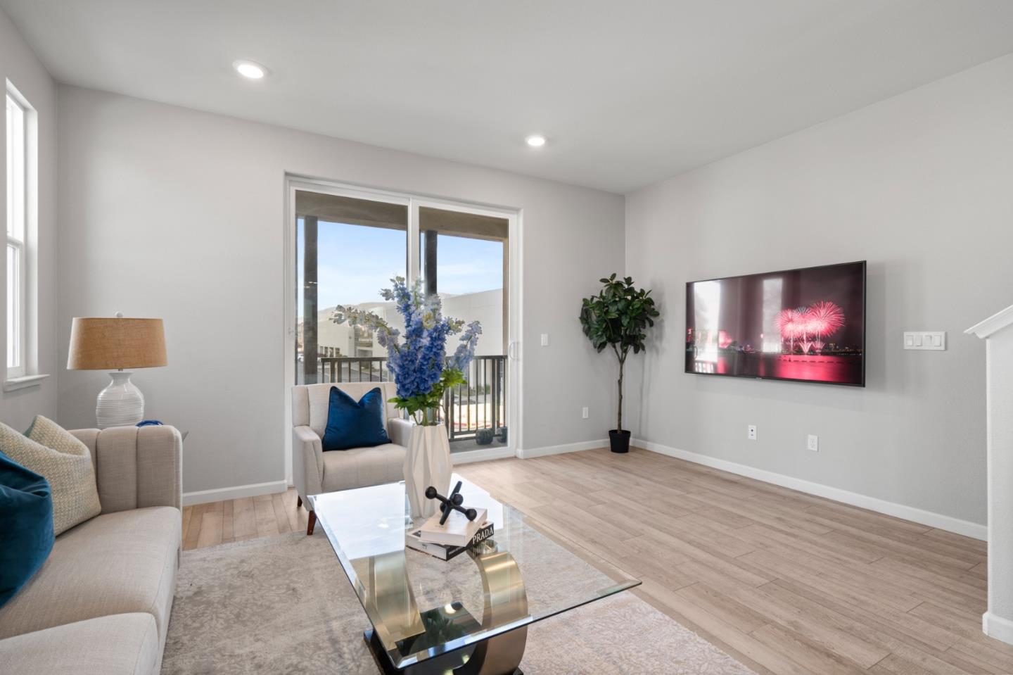 495 Snap Dragon Street Milpitas, CA 95035 - Photo 7 of 33 a living room with furniture and a flat screen tv