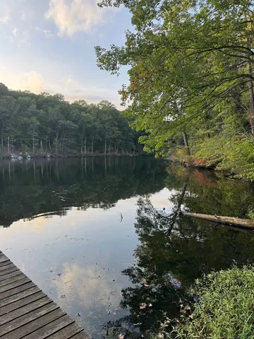 a view of a lake from a balcony