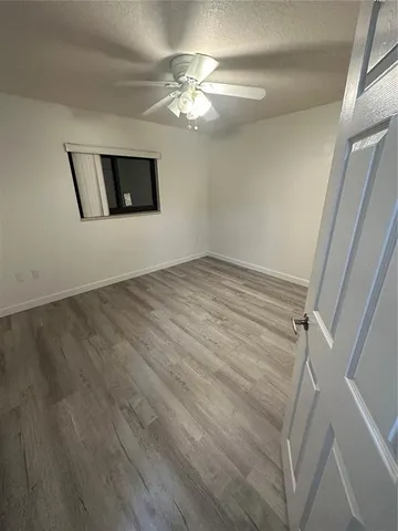 wooden floor in a hall with an entryway