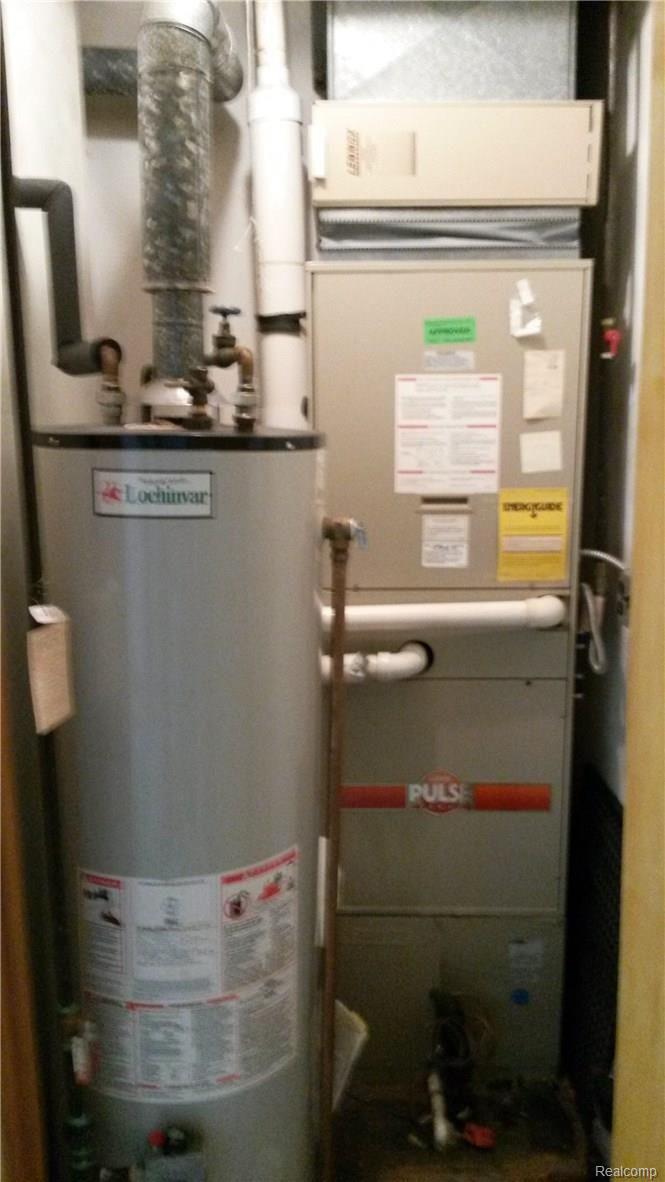 1195 Torpey Road Troy, MI 48083 - Photo 29 of 39 Furnace & Hot Water Tank Room.