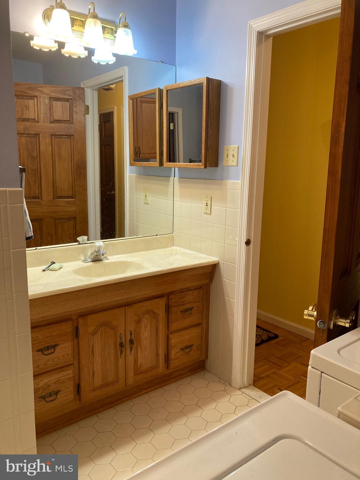 421 Lakeview Terrace Pemberton, NJ 08068 - Photo 11 of 23 a spacious bathroom with a granite countertop sink and a mirror