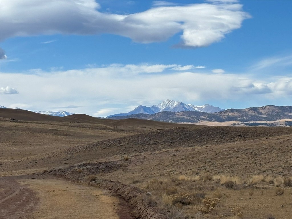 3779 Uxta Trail Hartsel, CO 80449 - Photo 2 of 12 a view of an lake and mountain