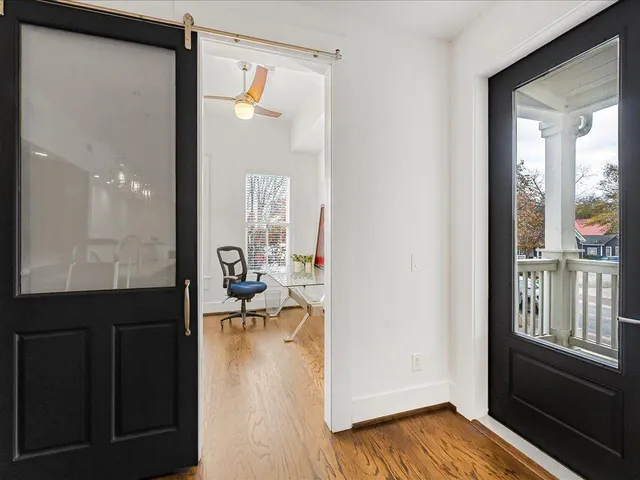 a living room with furniture and a table